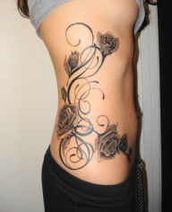 Black And Grey Rose Tattoo On Ribs